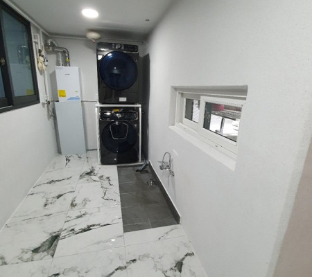 수원 영통의 새로운 변신: 거실과 주방을 하나로! 폴리싱타일로 완성한 리모델링 이야기